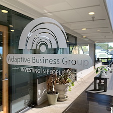 ADAPTIVE-BUSINESS-GROUP-FROST-FILM-INSTALLATION-LOGO-INSTALL 1